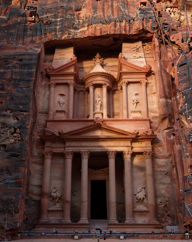 Ancient Treasury at Petra Jordan bathed in golden hour light representing Jordanian heritage